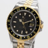 Rolex GMT Master II Reference 16713 18K Gold Steel Black Dial